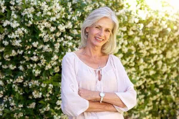 Older woman happy with urinary incontinence treatment Llanelli