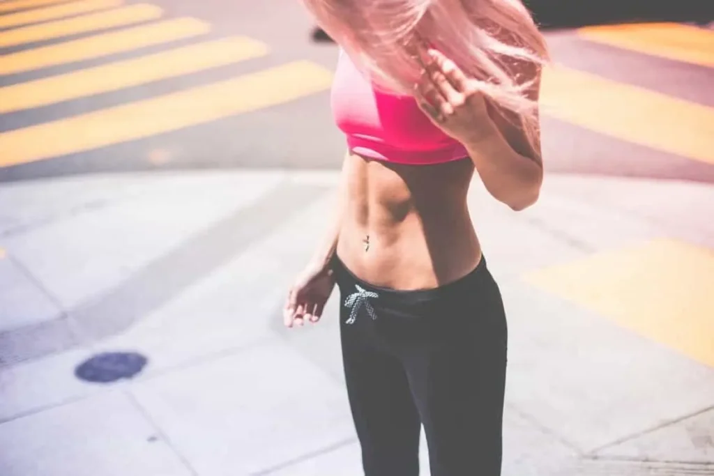 Woman with toned stomach after LA-EMS Body Sculpting Treatment Llanelli